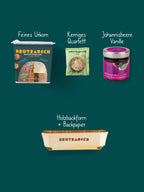 Inhalt Mitbringsel Geschenkbox M: Feines Urkorn, Kerniges Quartett, Fruchtaufstrich und Holzbackform
