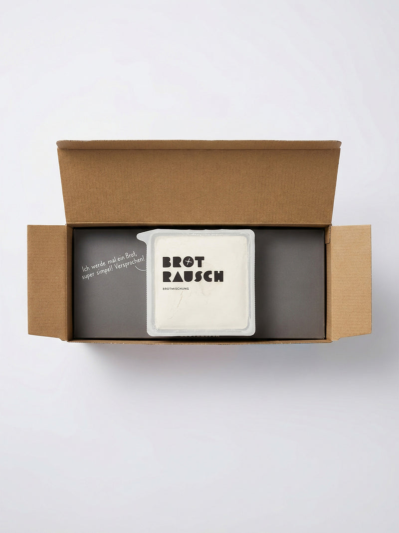 Brotrausch Geschenkbox im geöffneten Versandkarton, fertig verpackt zum Verschenken