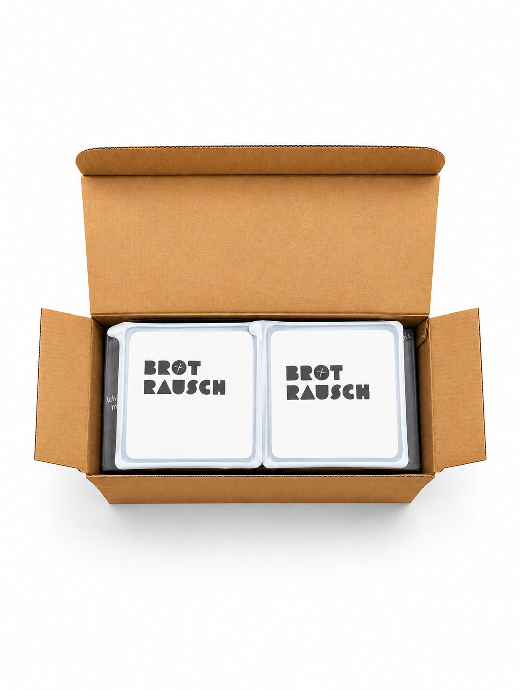 Brotrausch Geschenkbox mit zwei Brotbackmischungen im geöffneten Versandkarton