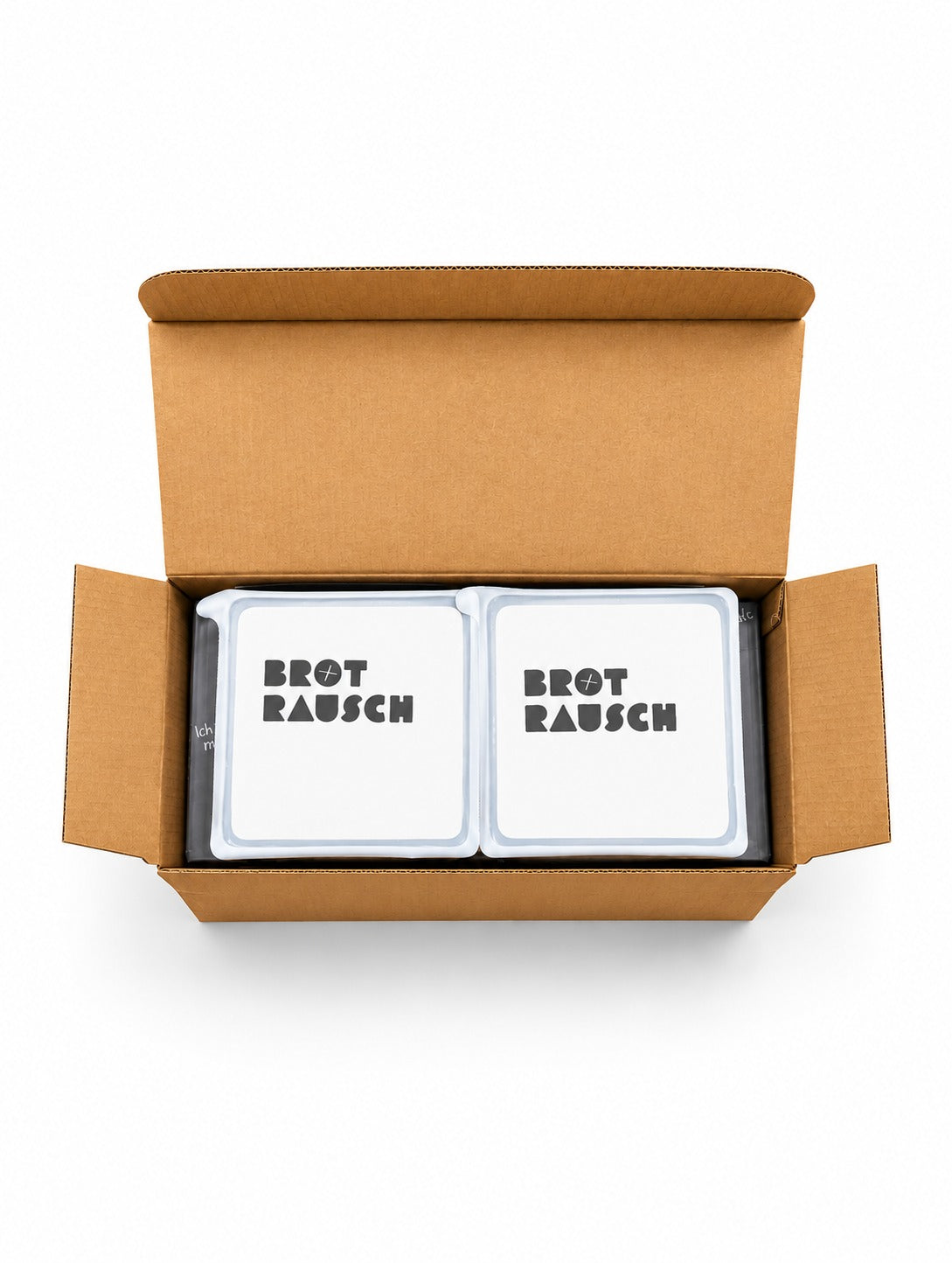 Brotrausch Geschenkbox mit zwei Brotbackmischungen im geöffneten Versandkarton