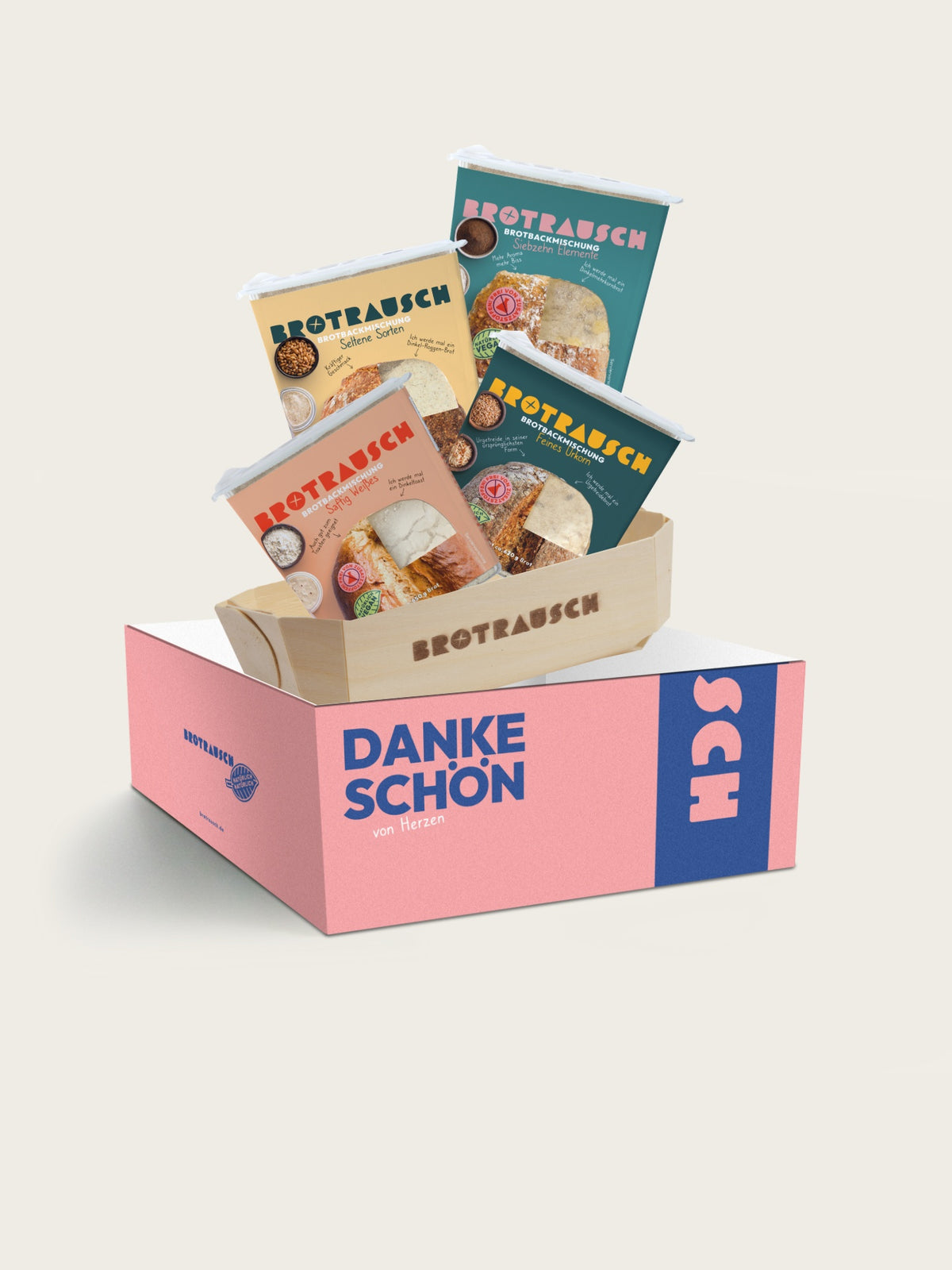 Dankeschön Geschenkbox L mit vier Brotbackmischungen, Toppings und zwei Holzbackformen