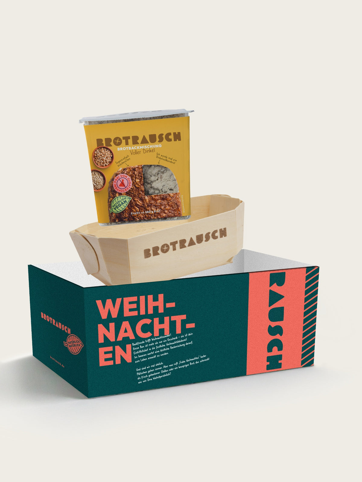 Geschenkbox Weihnachten S von Brotrausch: Brotbackmischung Voller Dinkel mit Holzbackform auf dem Weihnachtskarton